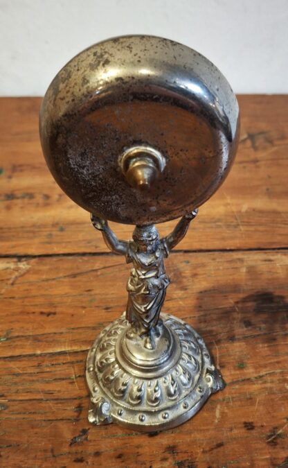 LOT 140 (32425) Est R500 to R1500 – A Late 19th Century – Early 20th Century  Italian Cast and Silvered White Metal Figural 
campana della pensione/guesthouse bell - Image 2