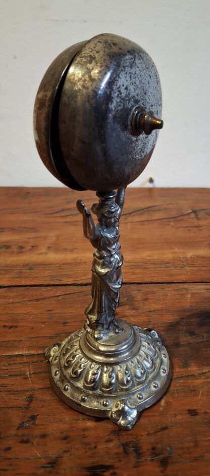 LOT 140 (32425) Est R500 to R1500 – A Late 19th Century – Early 20th Century  Italian Cast and Silvered White Metal Figural 
campana della pensione/guesthouse bell - Image 3