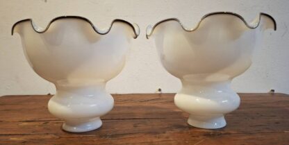 LOT 91 (32169156) Est R500 to R1500 – A Matching pair of Early 20th Century Milk Glass Encased Oil Lamp Shades