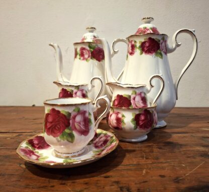 LOT 54 (32390) Est R2000 to R4000 – 12 x Royal Albert Old English Rose pattern Demitasse Cups and Saucers