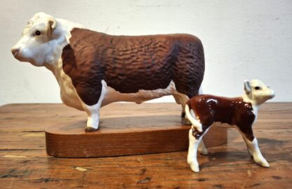 LOT 73 (32400) Est R500 to R1500 – A Scarce 20th Century English Beswick Animal Figurine, Hereford Bull on Stand