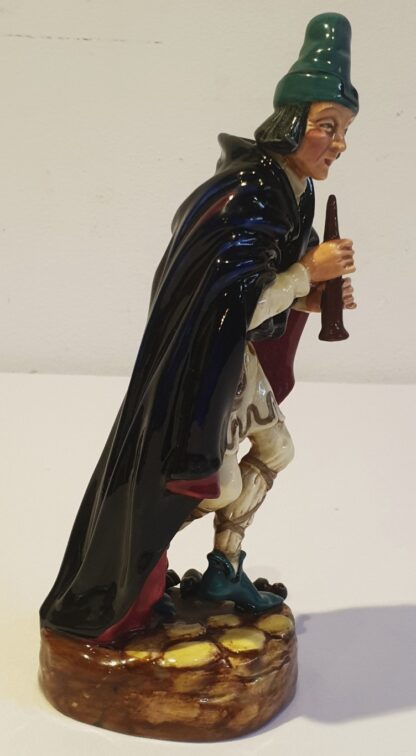 LOT 83 (31863151/16) Est R500 to R1500 – A Post-war Royal Doulton porcelain Figurine, The Pied Piper (Black, red and pale yellow colourway) - Image 3