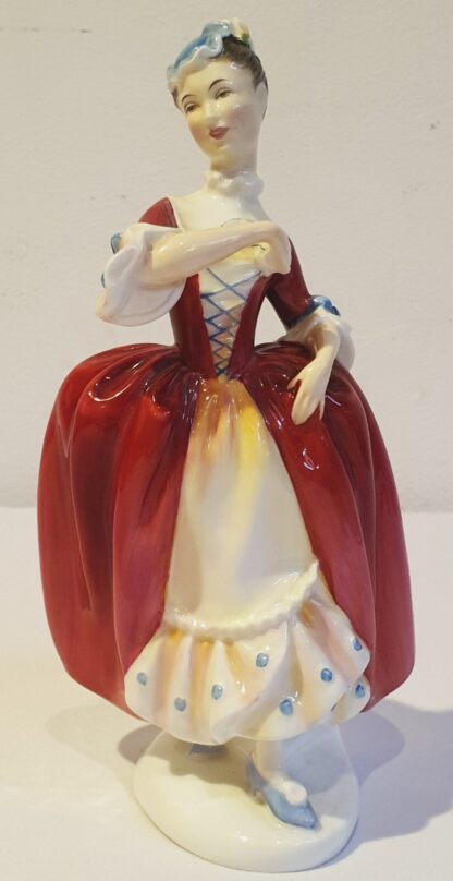 LOT 86 (31863151 / 13) Est R500 to R1500 – A Royal Doulton porcelain Pretty Ladies Series Figurine, Masquerade (Red colourway)