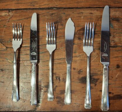 LOT 11 (32181152) Est R70000 to R100000 – A Handsome and Extensive Elizabeth II Silver Art-Deco-style Setting for 12 Canteen of Harley pattern Table Flatware and Cutlery (136pcs)